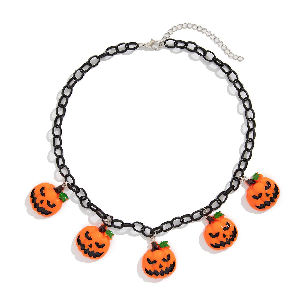 Halloween necklace showing a cartoon ghost and pumpkin acrylic pendant on a metal chain, in mixed colours.