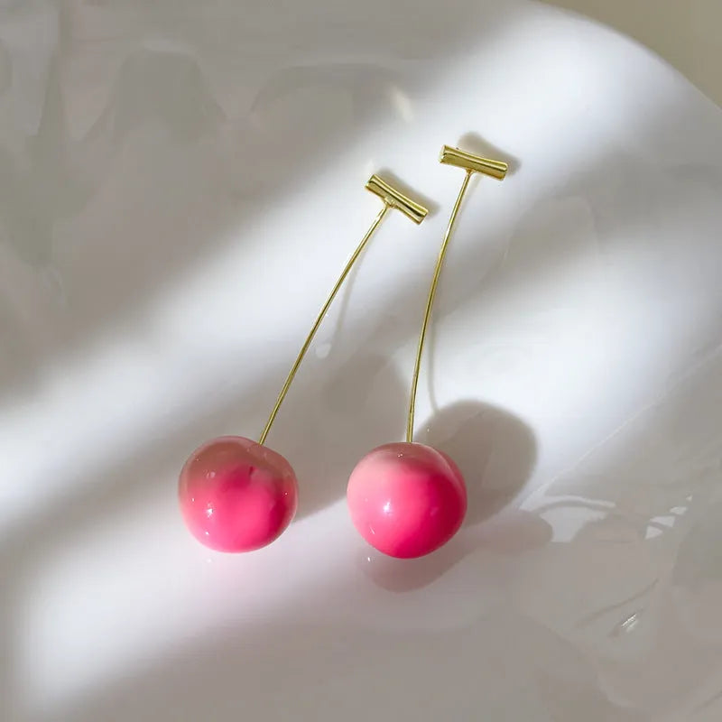 Acrylic juicy peach earrings in small and large sizes with copper hooks