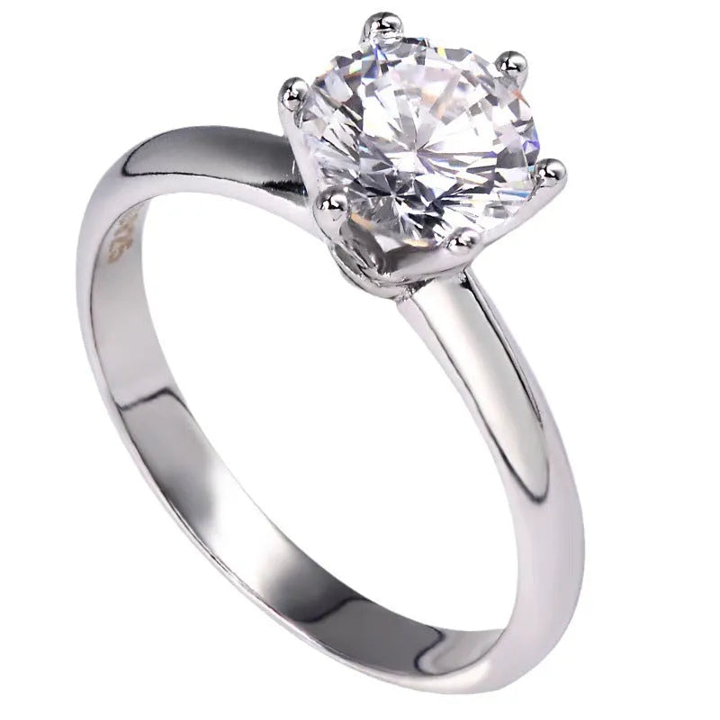 Six-claw inlaid zircon women's ring in white gold plating with geometric shape