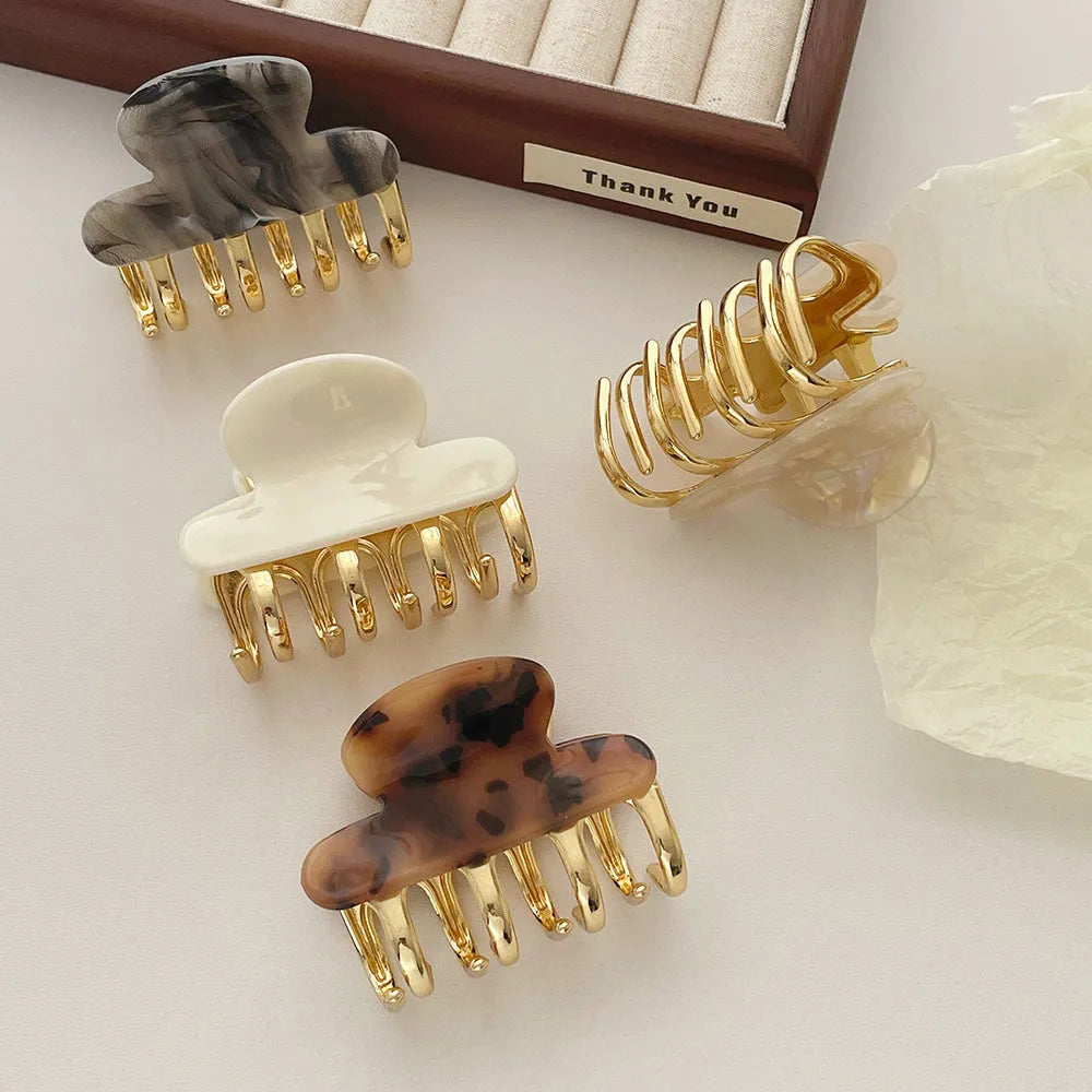 Women's medium metal grip hair barrettes in alloy acrylic with four colour options