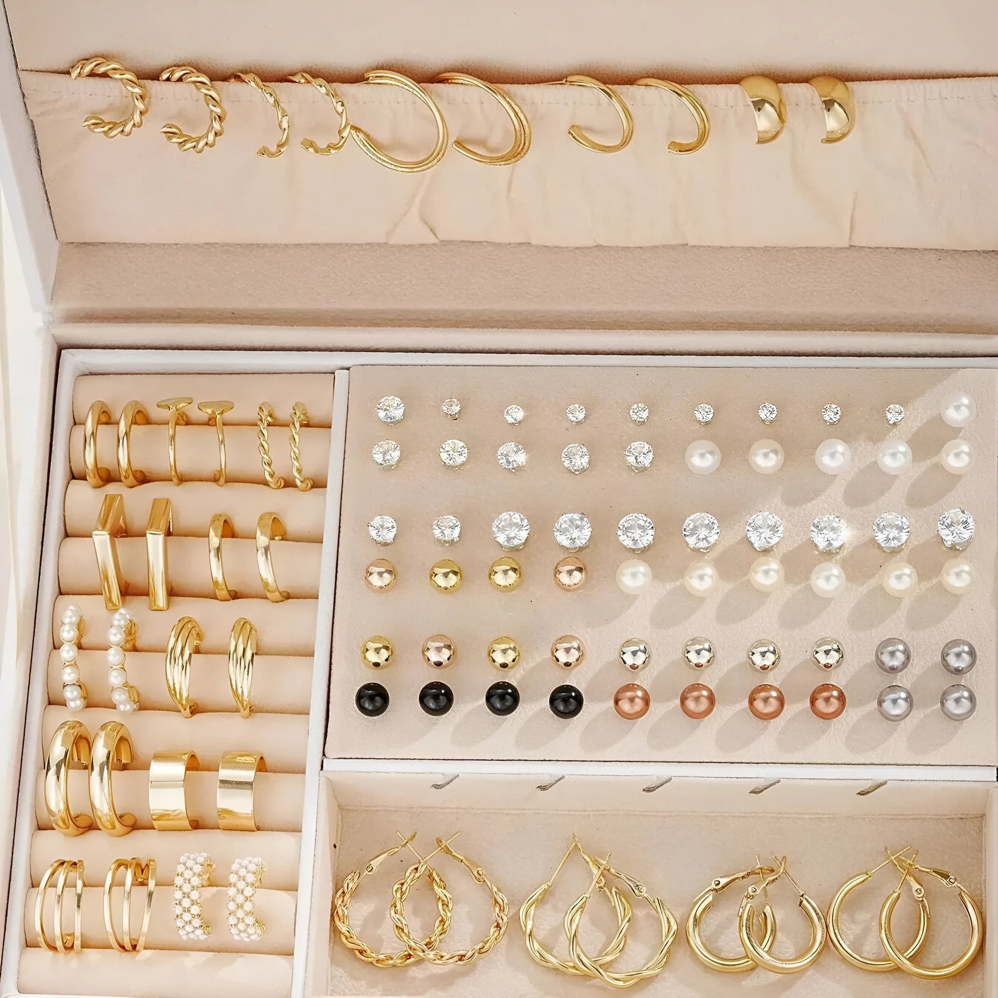 108 geometric pearl earrings assortment showing gold and yellow electroplated colours on alloy construction