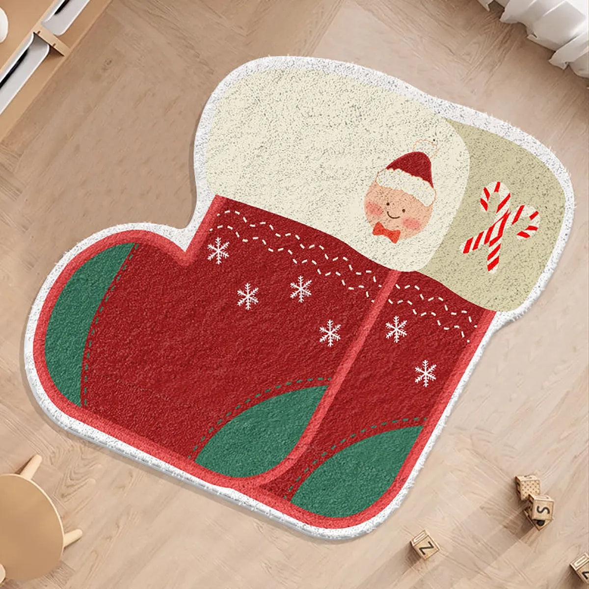 Round alien-shaped Christmas carpet in imitation cashmere, showing one of six festive colour designs.