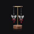 Silver diamond bat nipple clamp adjustable clitoral clip jewellery on black background