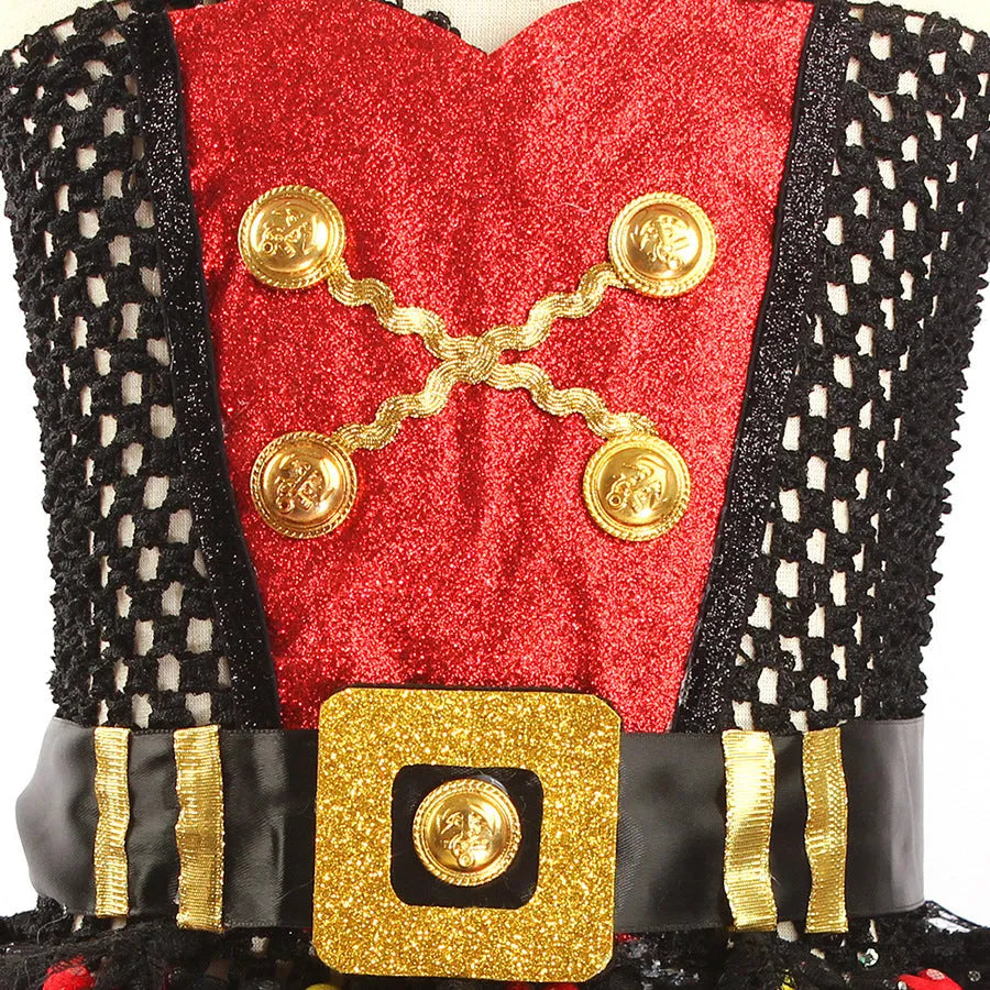A sleeveless girls pirate dress costume with sequin and mesh decoration, shown with an optional black eye mask.