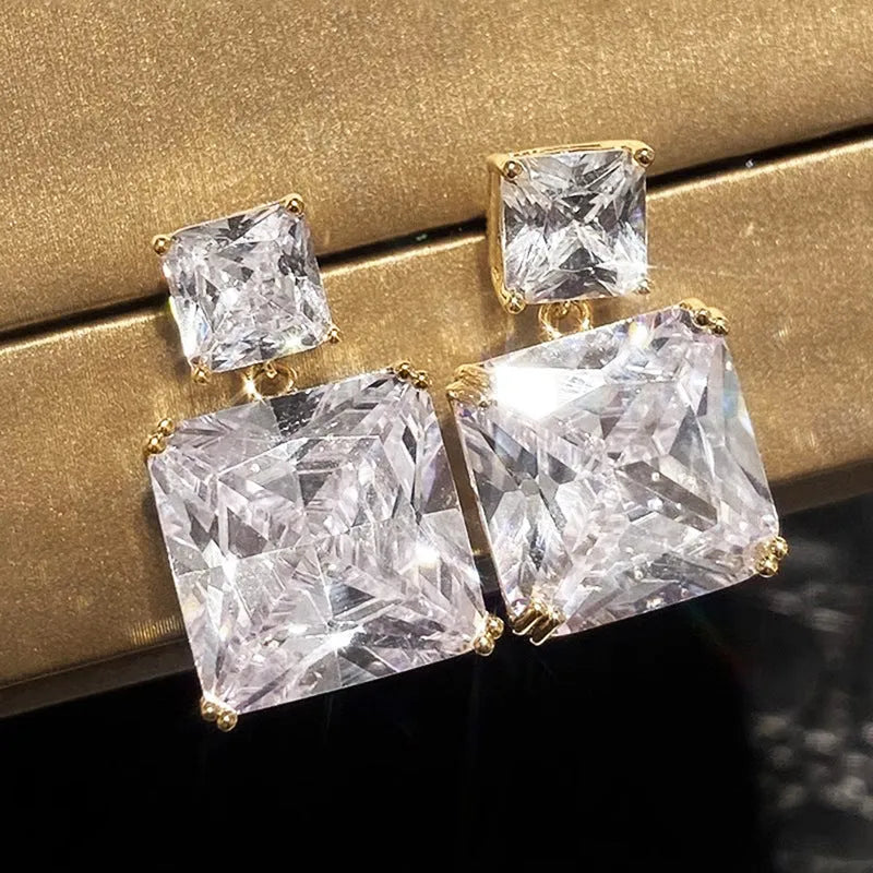 Copper geometric square design earrings with quadrilateral ornament in white gold or golden finish