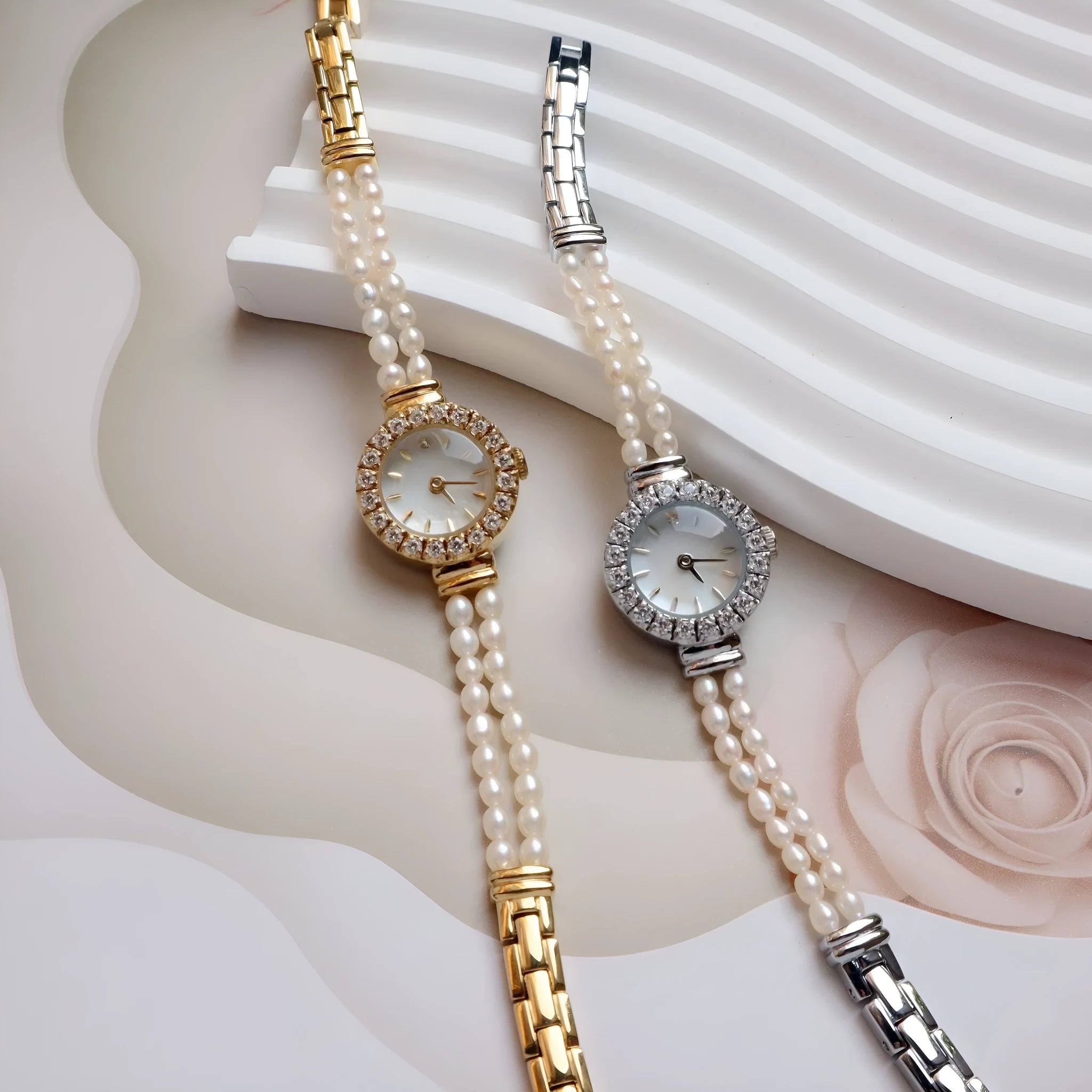 Women's light gold freshwater pearl bracelet watch with 18mm round dial and stainless steel construction