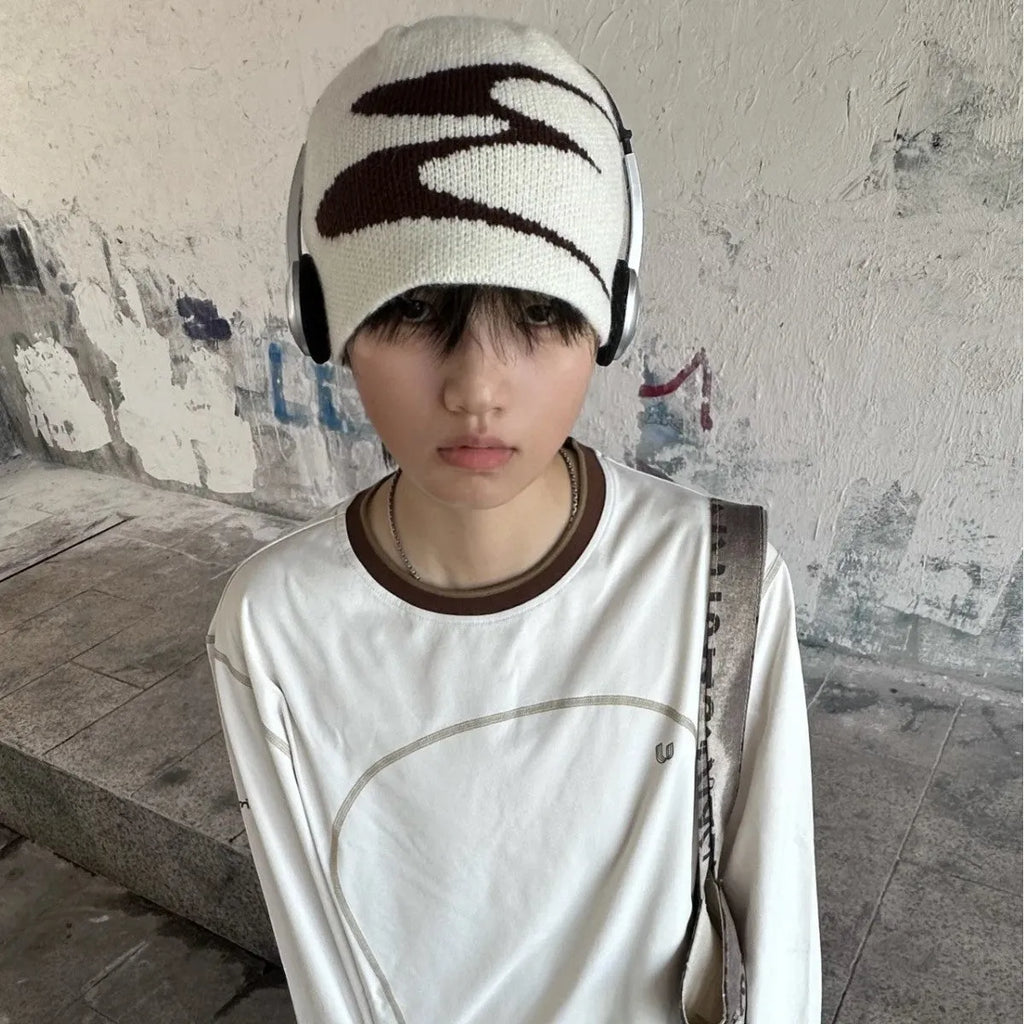 Acrylic knitted beanie hat in black, grey or white colours with 56-58cm head circumference