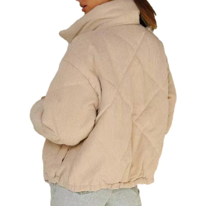 Women's apricot-coloured corduroy jacket with a stand collar and front zipper, laid flat.