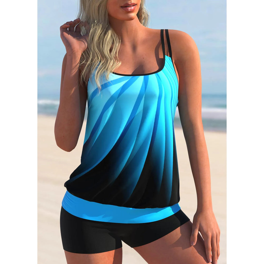 Plus size women's swimsuit set with butterfly print, featuring a strapped top and matching shorts.