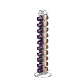 Black wrought iron coffee capsule storage rack holding pods on shelves.