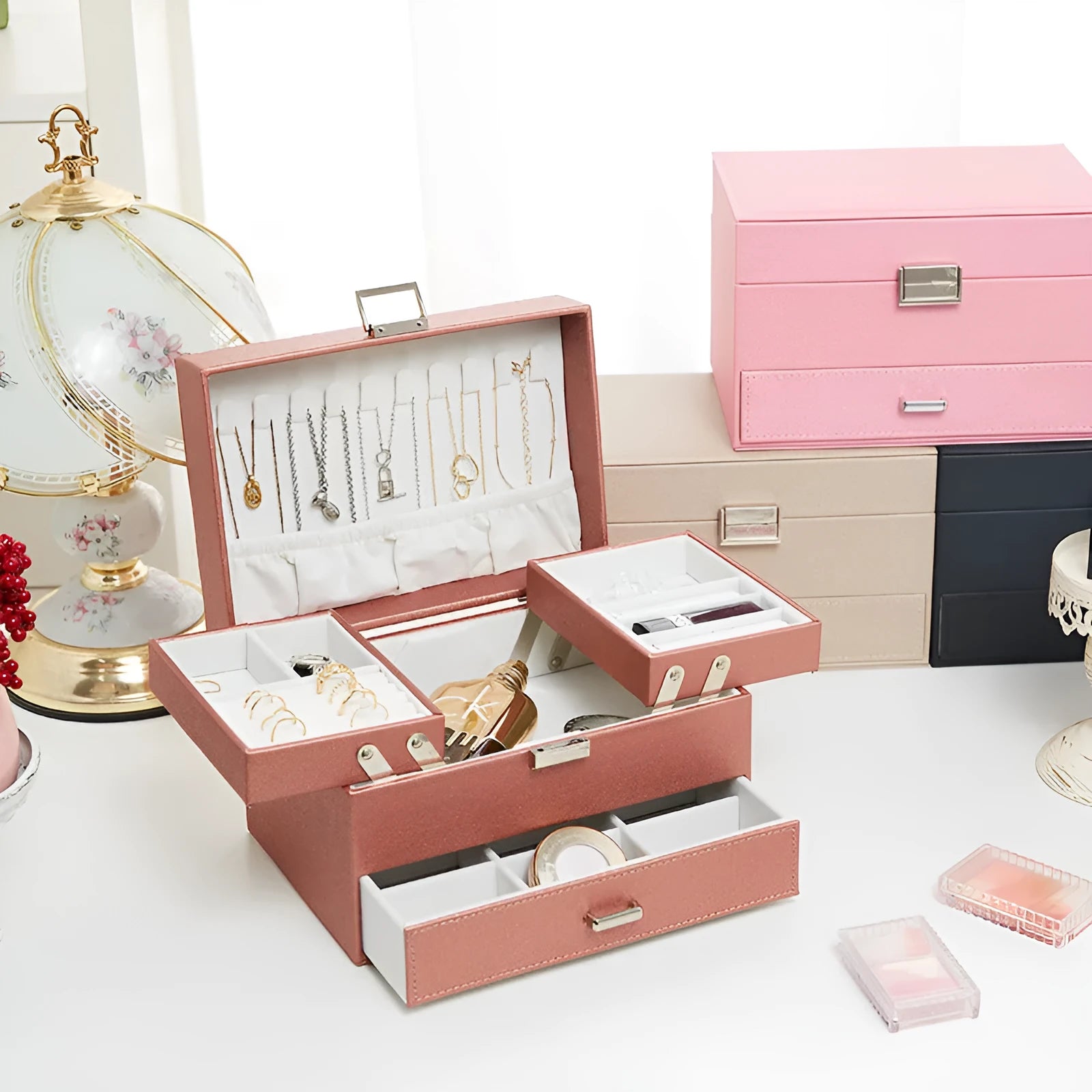 Hard-shell PU leather jewelry storage box in beige, black, pink, or rose gold.