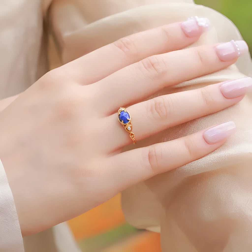 Japanese style silver ring with oval lapis lazuli stone and geometric design