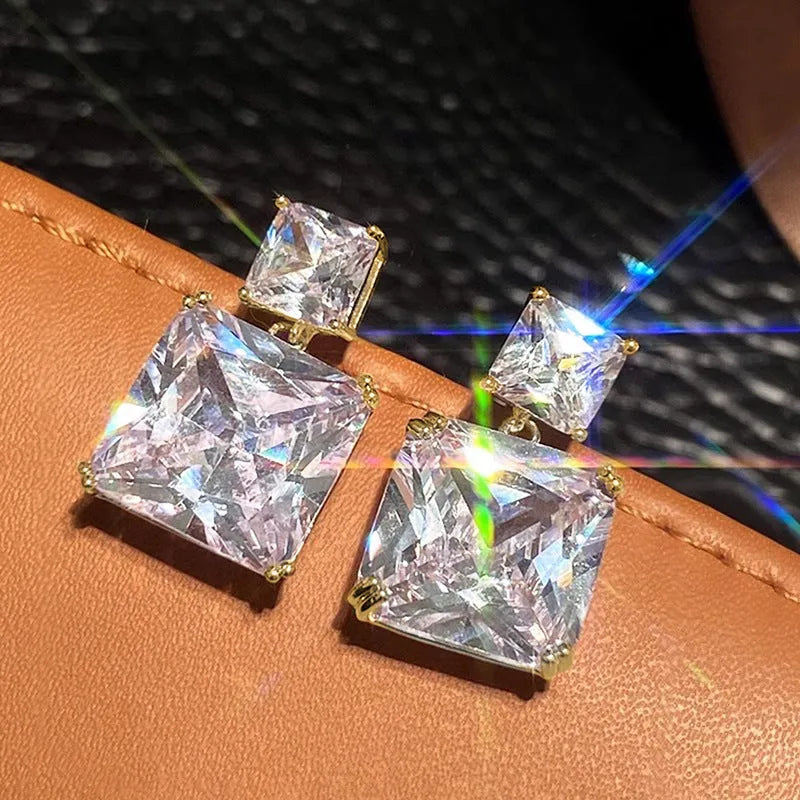 Copper geometric square design earrings with quadrilateral ornament in white gold or golden finish