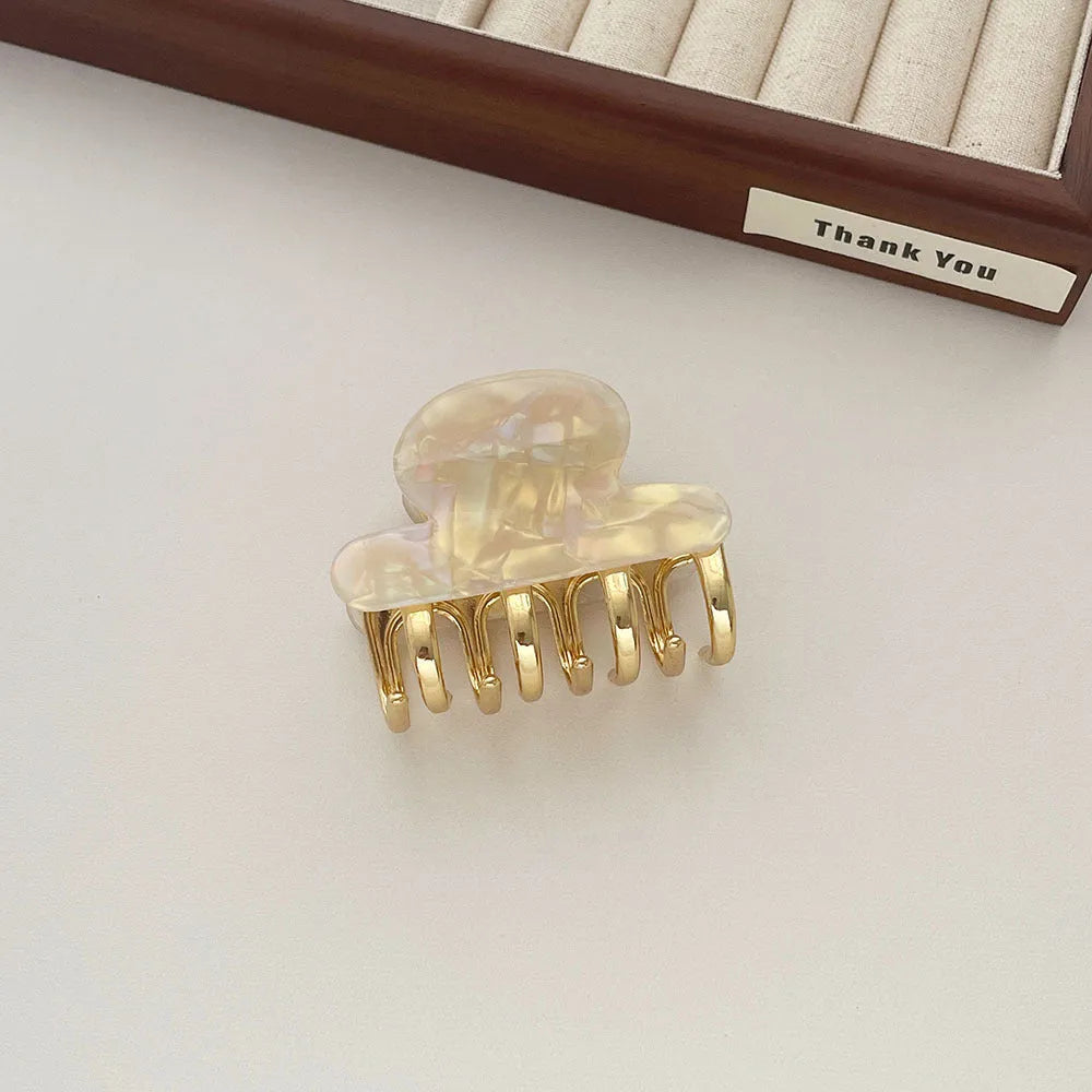 Women's medium metal grip hair barrettes in alloy acrylic with four colour options