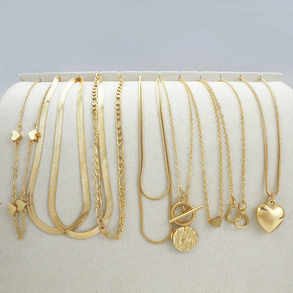 Gold electroplated women's necklace set with snake bones chain and adjustable length jewellery