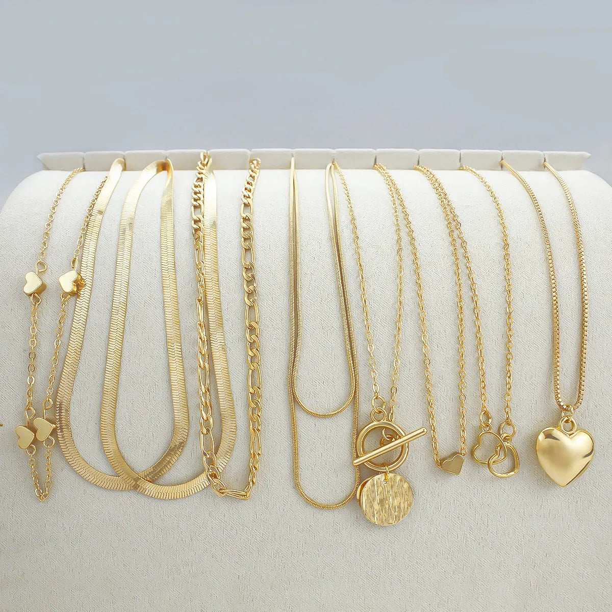 Gold electroplated women's necklace set with snake bones chain and adjustable length jewellery