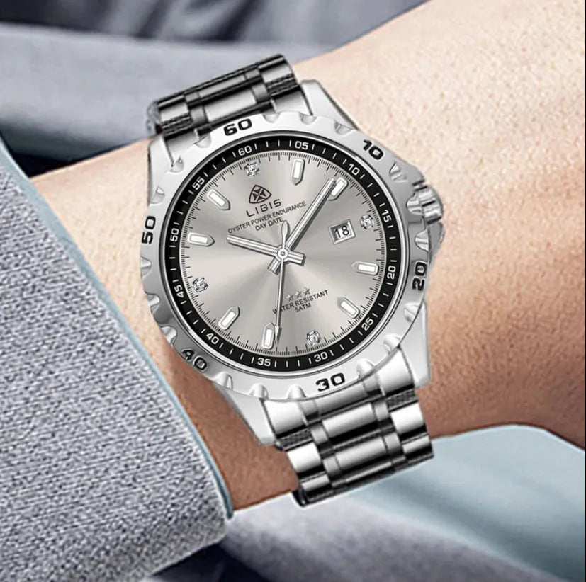 Men's silver quartz watch with luminous hands, stainless steel strap and sapphire crystal glass