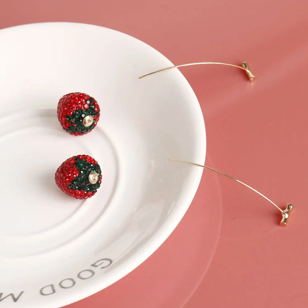 Red zinc alloy strawberry earrings with geometric spot drill design for women.