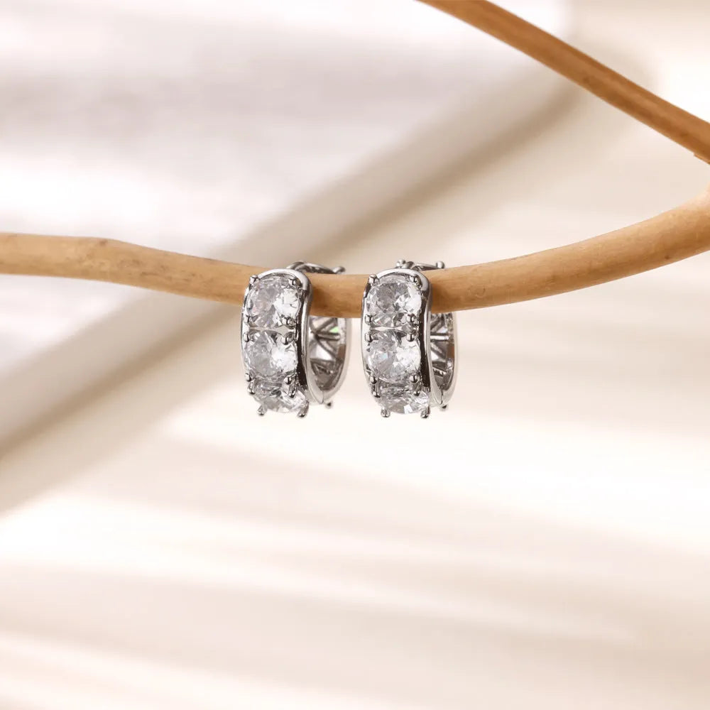 Stainless steel U-shaped clip earrings with inlaid zircon accents in colour E5772P