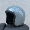 FRP retro half motorcycle helmet shown in various colours for electric bike commuting