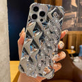 Silver diamond bracelet phone case for iPhone with chain and rhinestone lock on a TPU back.