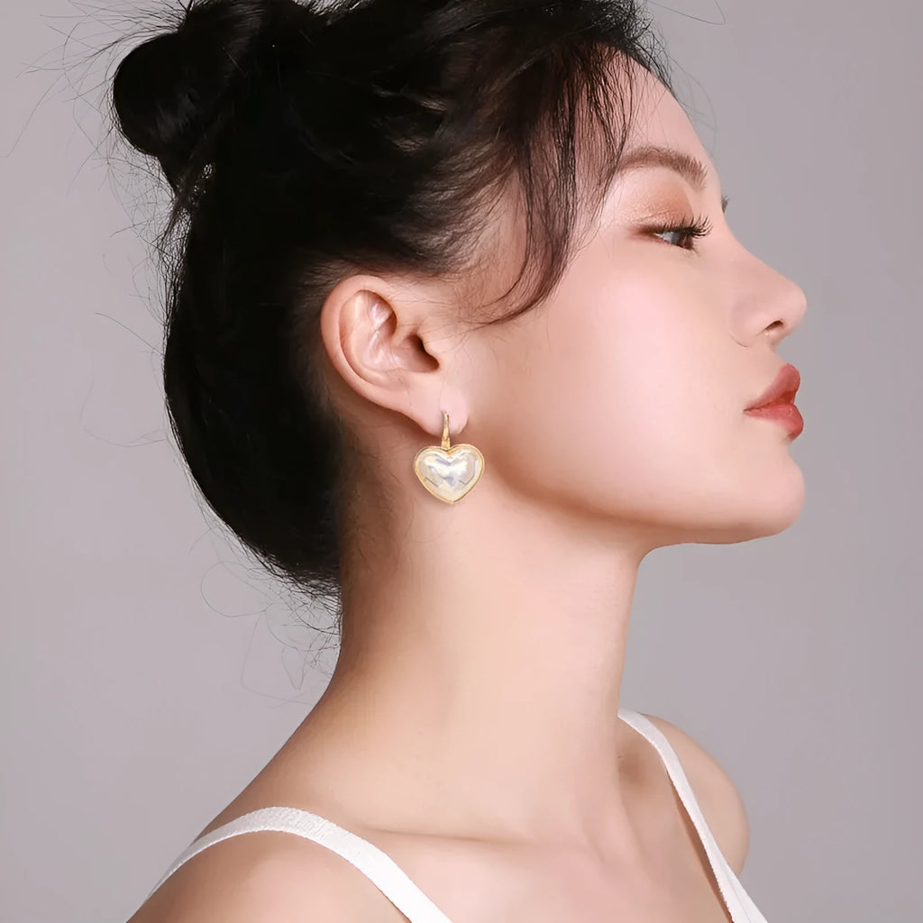 Gold colour alloy ear clips with metal elements and natural style for women