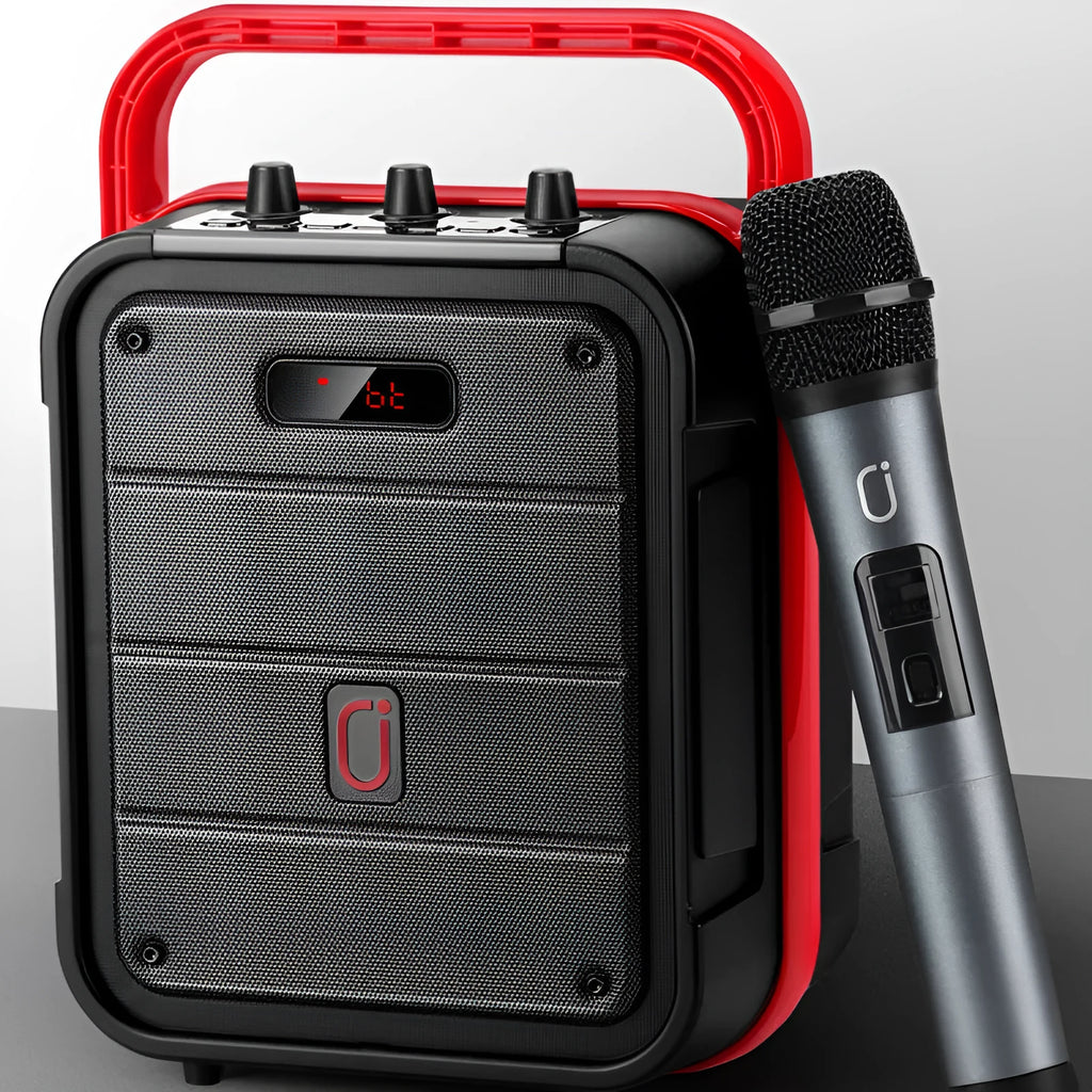 MS62AI black portable Bluetooth speaker with wireless microphone on a table.