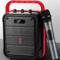 MS62AI black portable Bluetooth speaker with wireless microphone on a table.