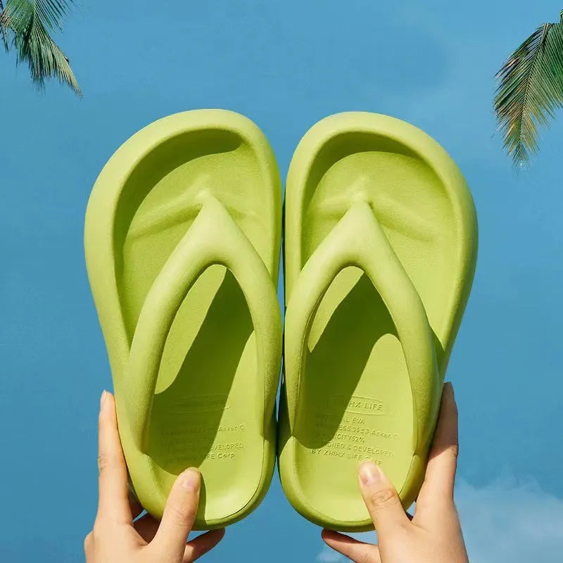 Women's solid colour EVA flip-flops with a thick sole and a bow detail on the upper.