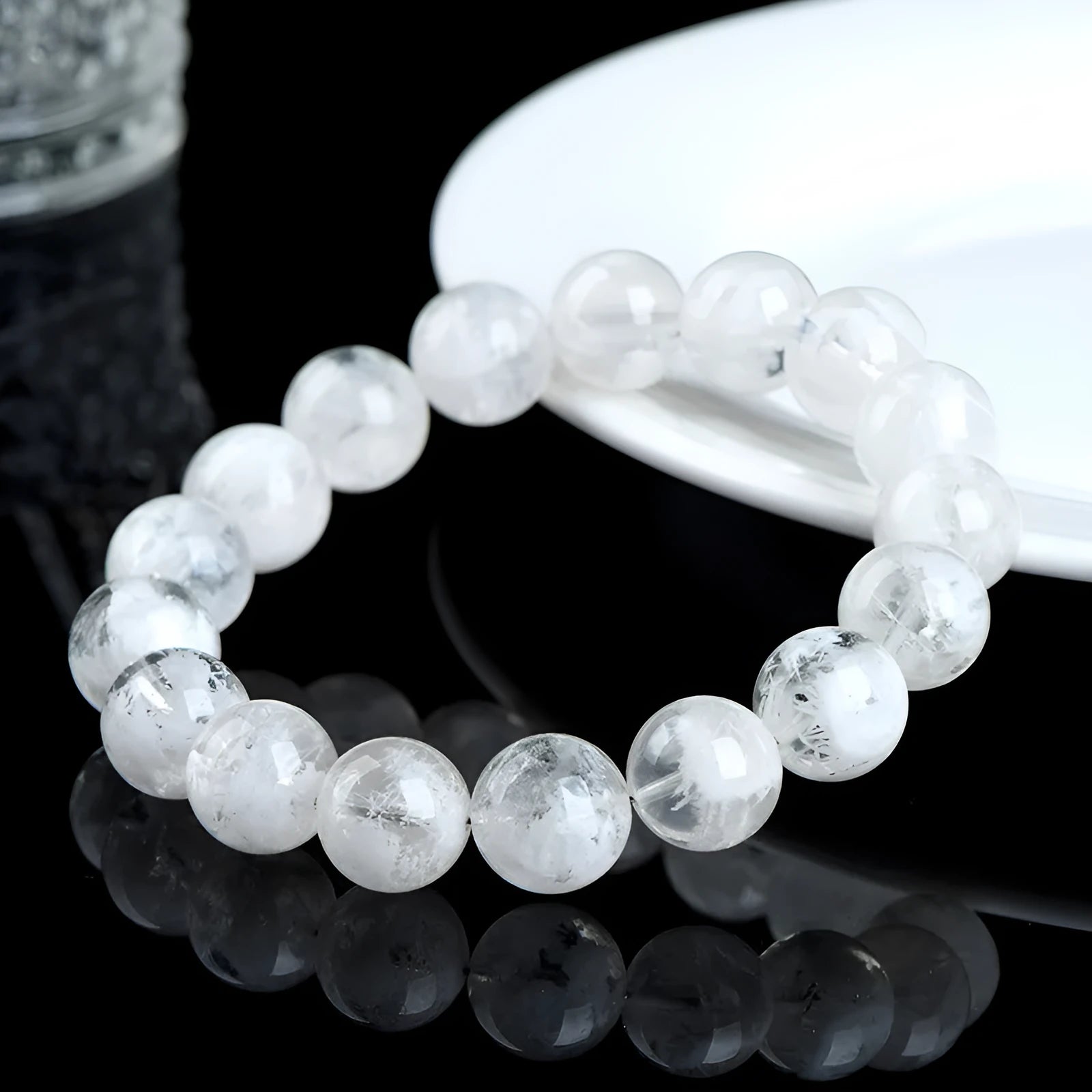 Crystal women's bracelet with natural blizzard snowflake round beads in geometric design featuring Ruyi and Xiangyun elements