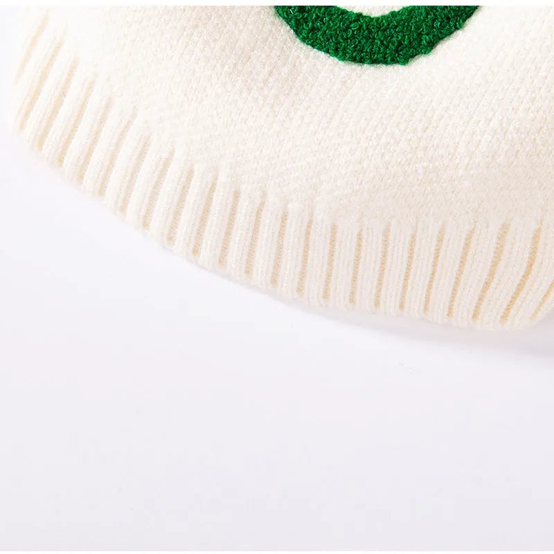 Knitted small dog sweater in white with multicolour Apple and smiley face embroidery