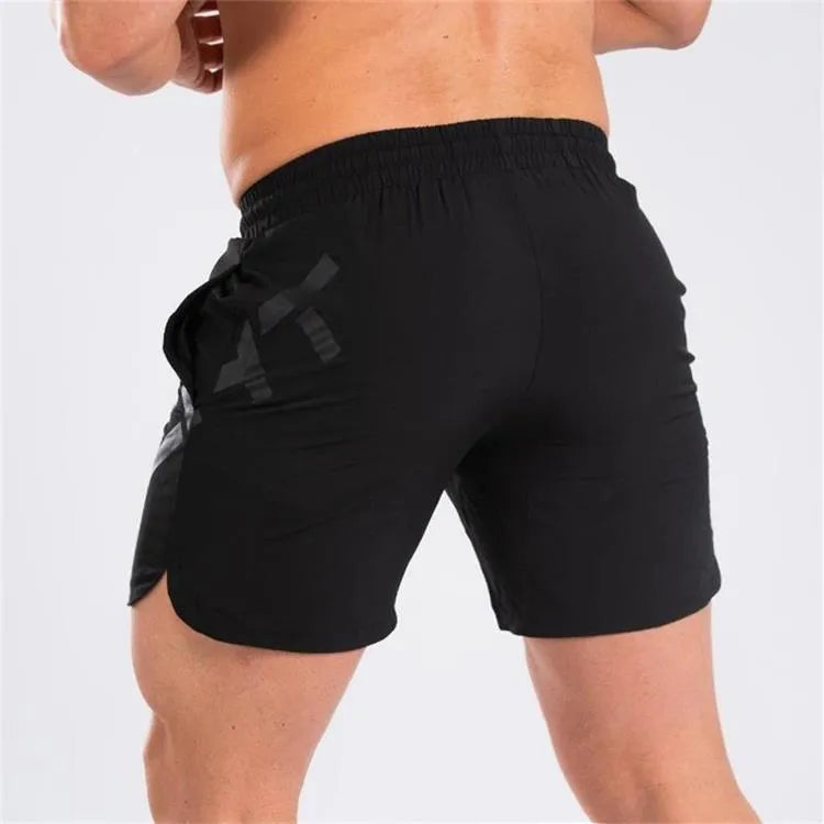 Men's black knee-length training shorts with quick-dry nylon fabric for summer running