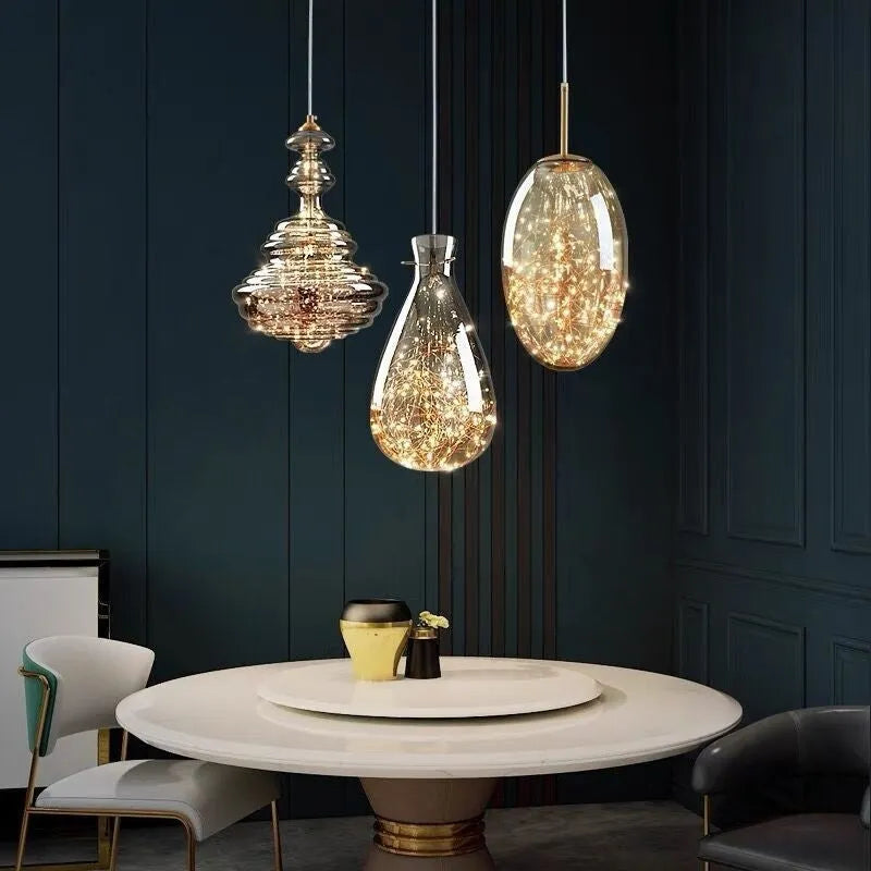Modern glass droplight chandelier with adjustable suspension showing clean contemporary design