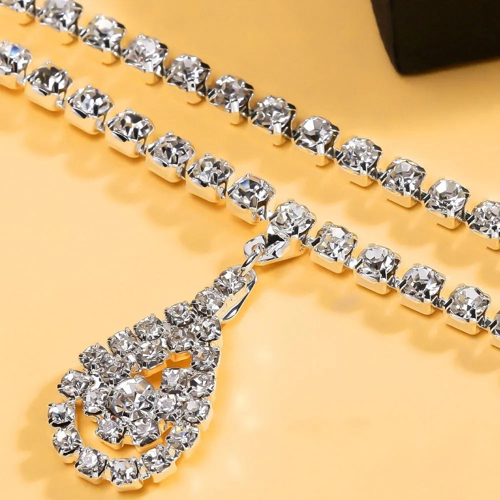 Gold waist chain with rhinestone water drop pendant and adjustable lobster clasp