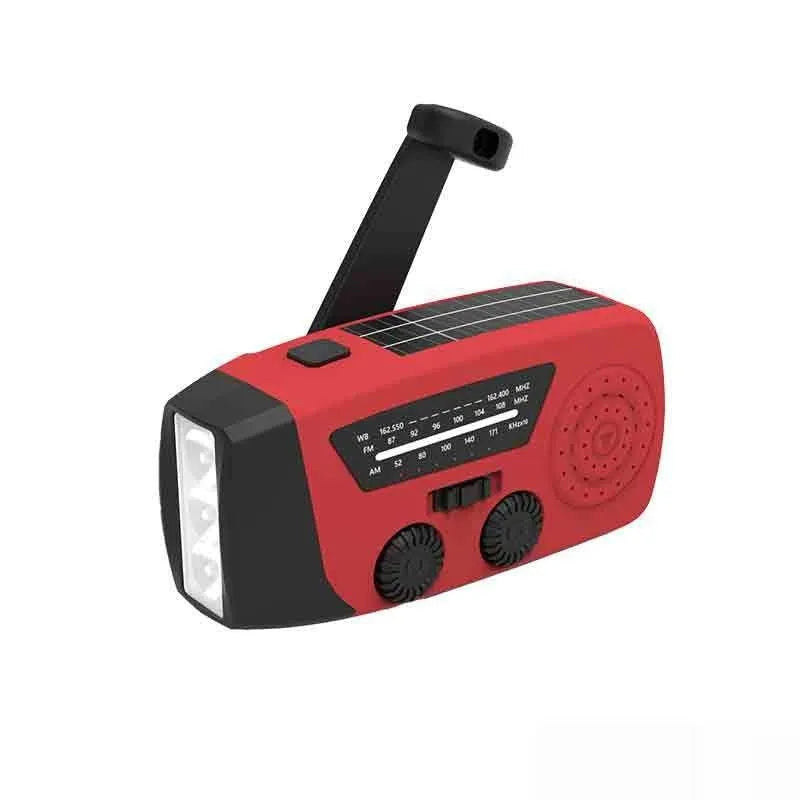 Red rechargeable emergency hand radio torch with USB port and wrist strap