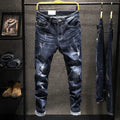 Men's slim-fit skinny jeans in dark blue cotton denim on a hanger.