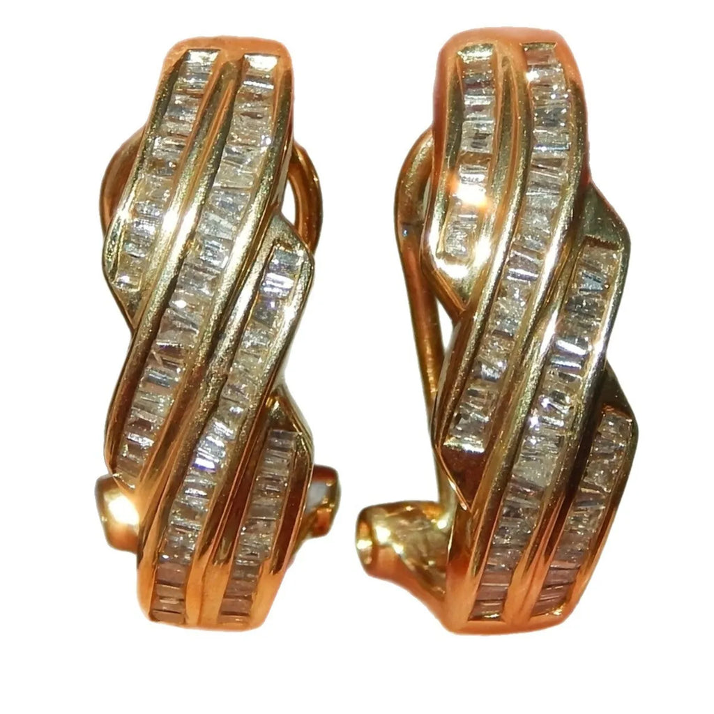 Geometric round copper earrings with gold colour finish on display