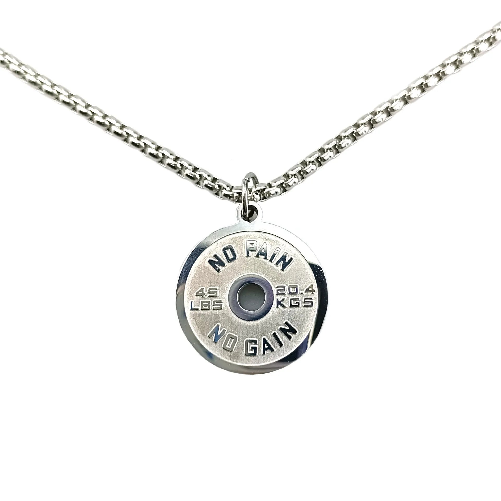 Polished stainless steel barbell disk pendant on a 60cm chain, a fitness-inspired geometric necklace.