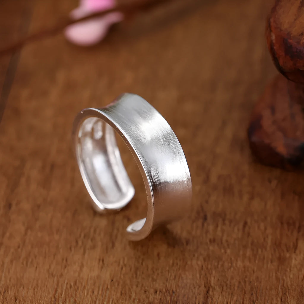 Adjustable geometric open ring with a Korean frosted sterling silver finish.
