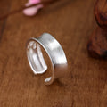 Adjustable geometric open ring with a Korean frosted sterling silver finish.