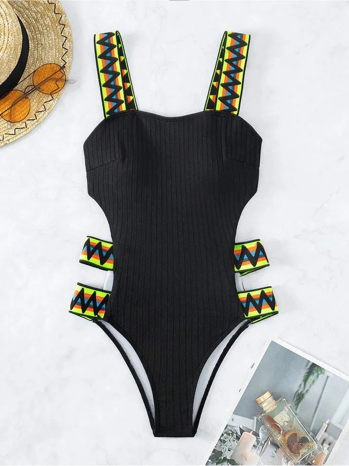 Women's black or orange solid colour one-piece swimming suit bikini