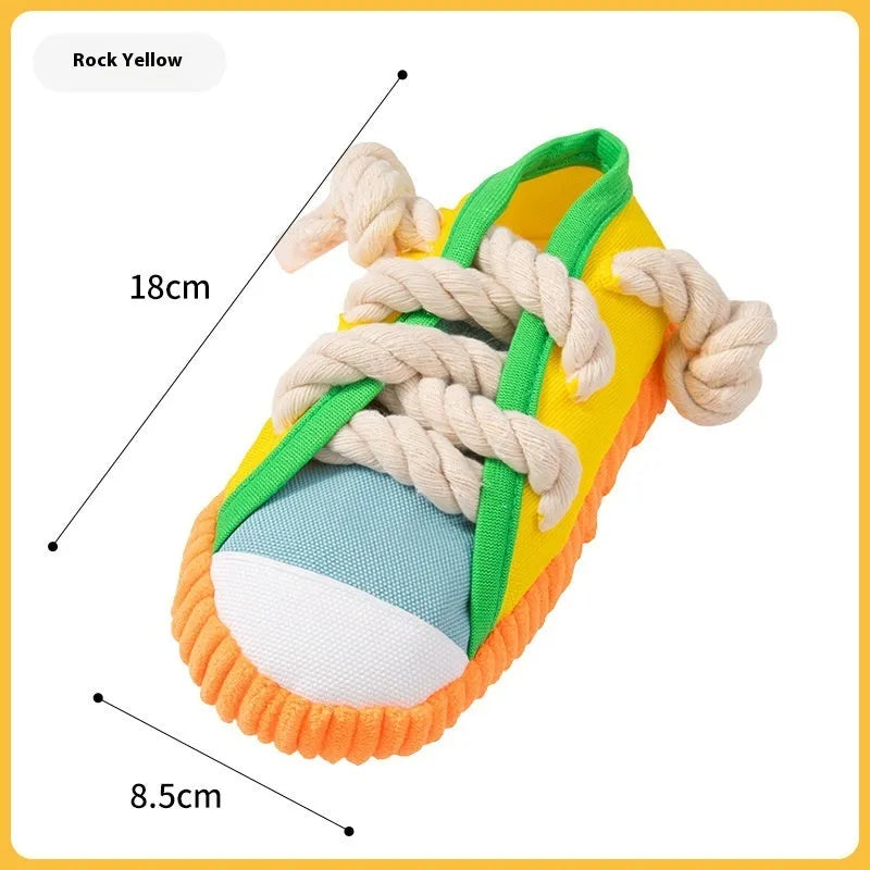 Plastic dog sound slippers chew toy in yellow, black, or blue with bends and hitches for teething.
