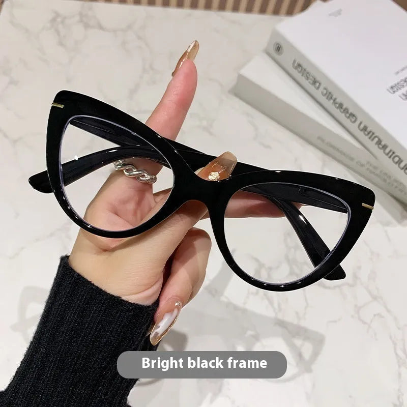 Women's cat eye shaped presbyopic reading glasses with dragon and phoenix decorations on the frame.