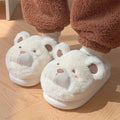 Women's plush slippers with suede upper, fleece lining and cartoon pattern in round toe design