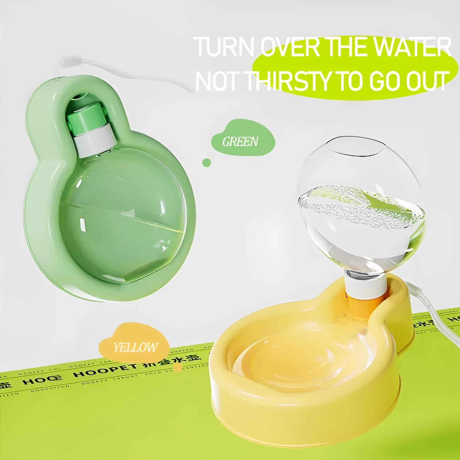 Green portable dog travel cup with pull-out bowl and handle, shown next to a backpack.