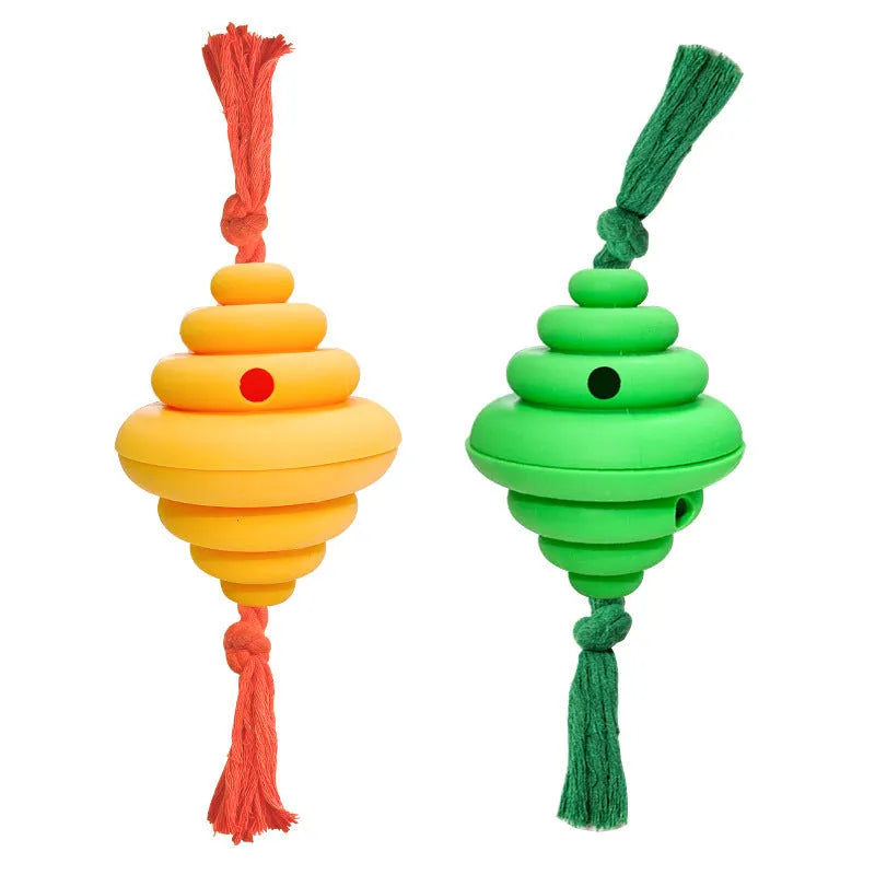 Green and yellow dog ball with rope toy showing split oval spiral design and integrated rope handle