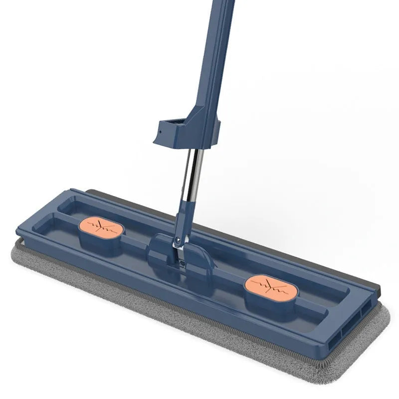 Large flat mop with stainless steel handle and blue cloth on hard floor