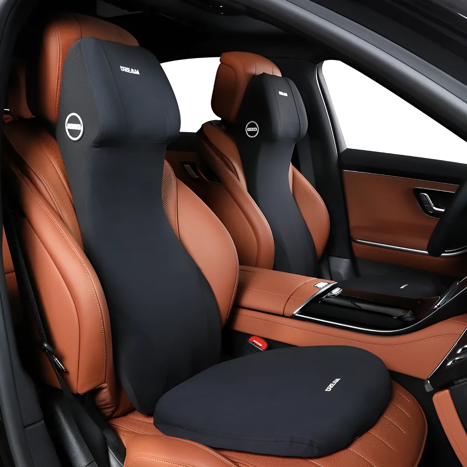 Black automotive memory foam waist cushion and headrest lumbar support pillow on a car seat.