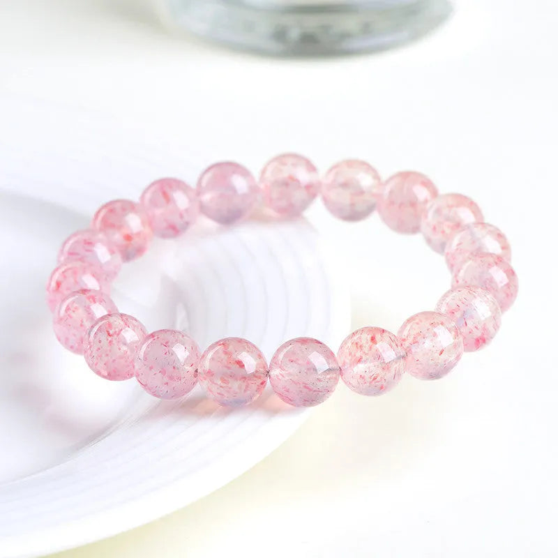 Strawberry quartz crystal bracelet with geometric beads in natural white water colour