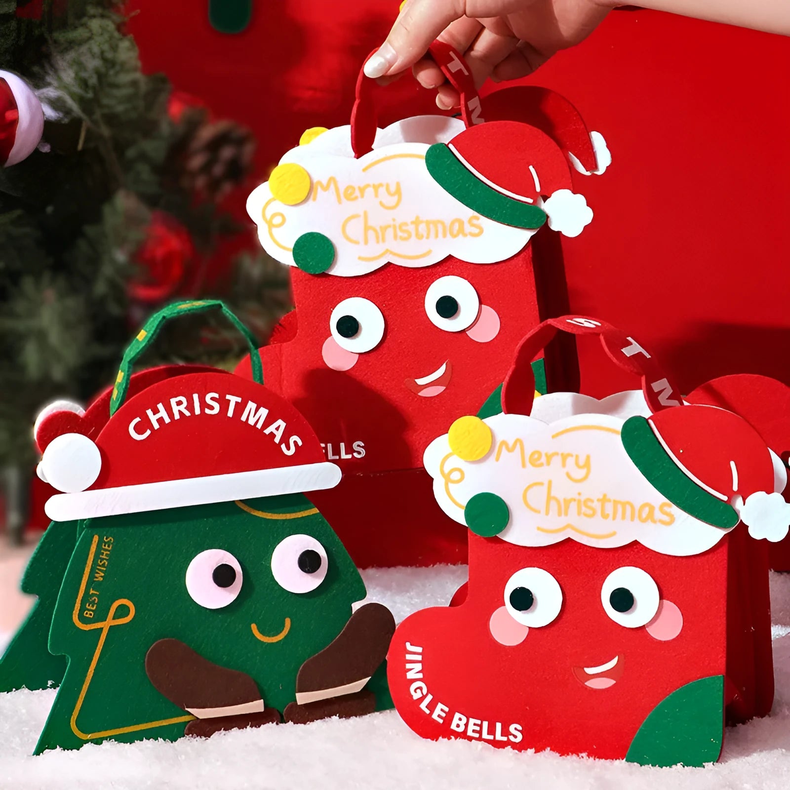 Green felt gift bag for Christmas gift wrapping with festive design